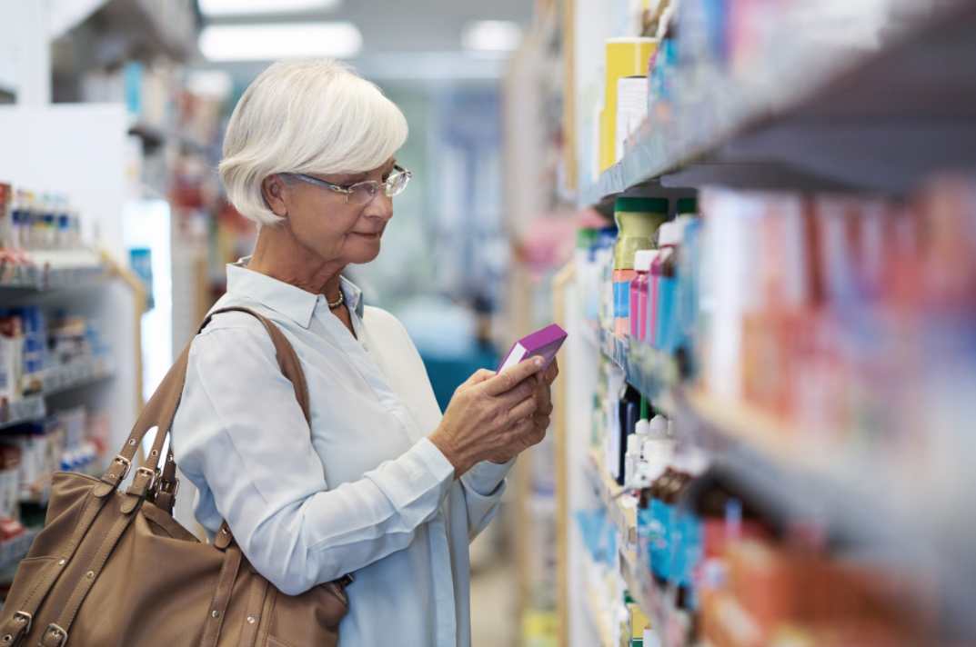 A woman is selecting products